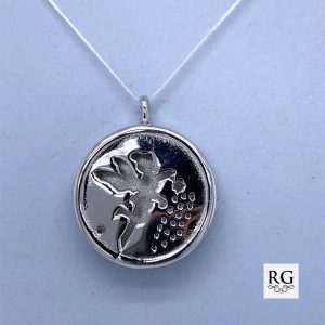 925 CUT OUT FAIRY ROUND LOCKET - 21MM <br/>11412