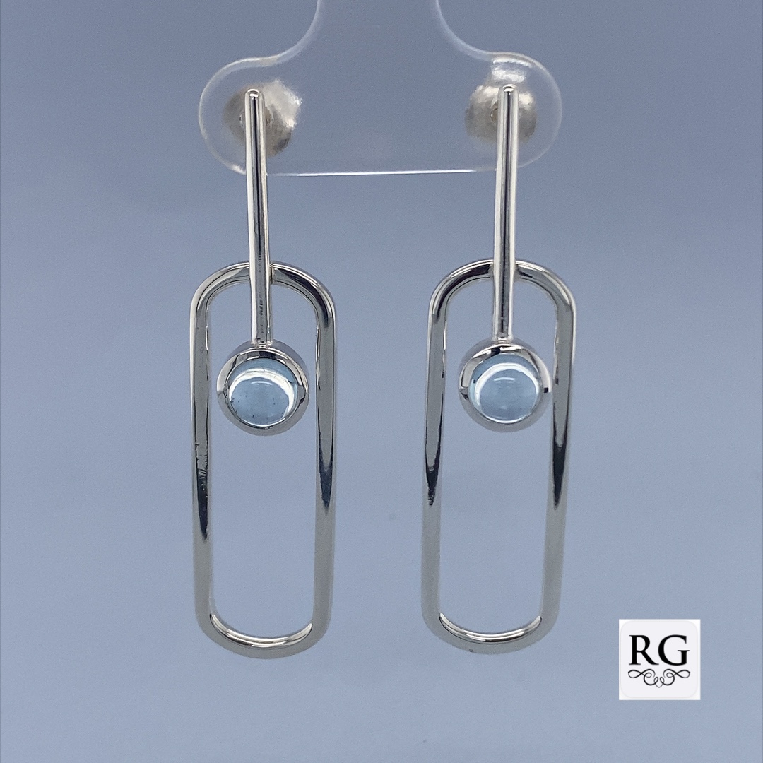 925 SKY BLUE TOPAZ IN OPEN CUT OVAL EAR - 42X10 <br/>11501