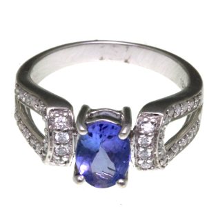 18CT WG TZ:1.2CT 38DR:0.36CT GH DIA RING - 7.6MM <br/>M3154