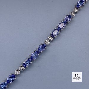 9CT WG TZ:8.84ct DR:0.27ct GH TENNIS BRAC - 4.7MM